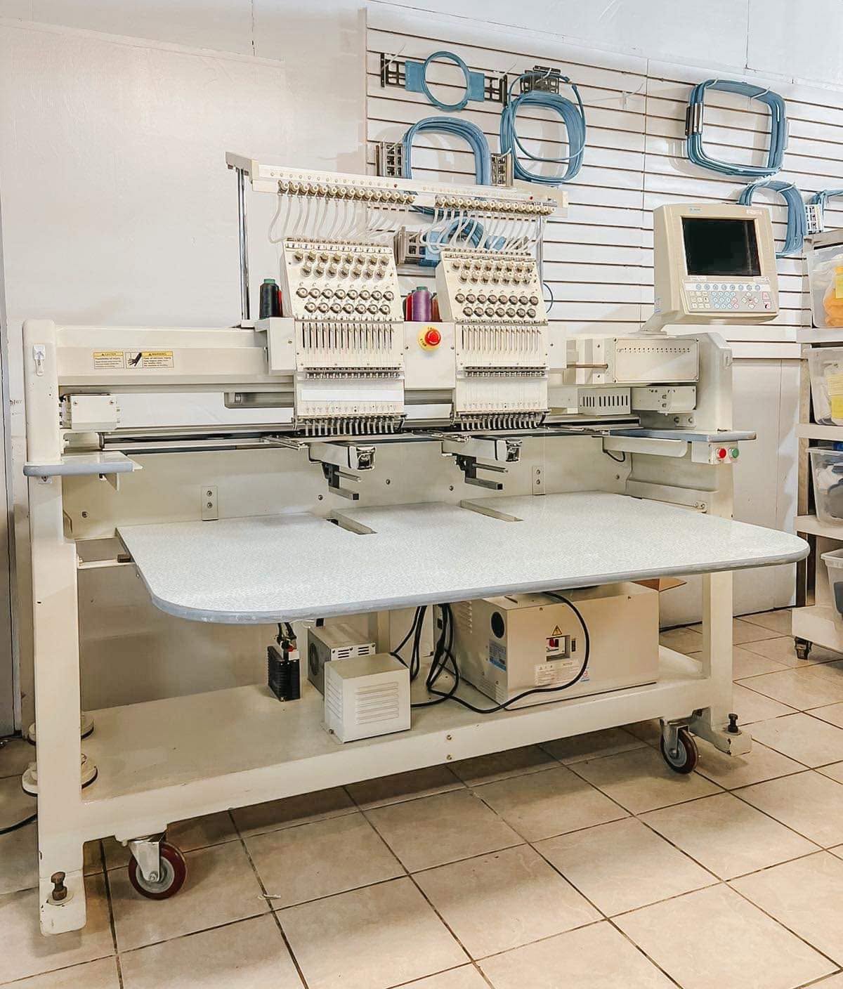 Two-head embroidery machine on the Impress production floor