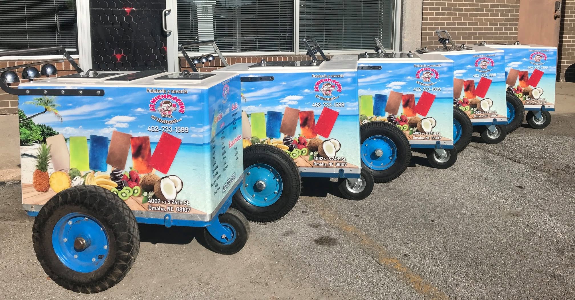 La Michoacana paleteria pushcart wraps installed by Impress